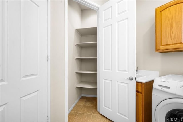 1706 Brittney Rd, Beaumont, CA 92223 - laundry area with cabinet space and washer / clothes dryer