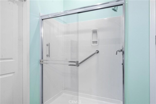 1706 Brittney Rd, Beaumont, CA 92223 - bathroom featuring a shower stall