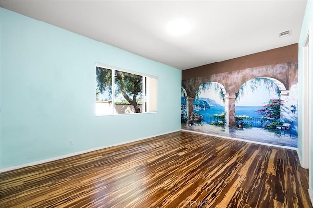 1706 Brittney Rd, Beaumont, CA 92223 - empty room featuring wood finished floors and baseboards