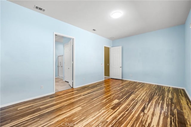 1706 Brittney Rd, Beaumont, CA 92223 - empty room featuring wood finished floors and baseboards