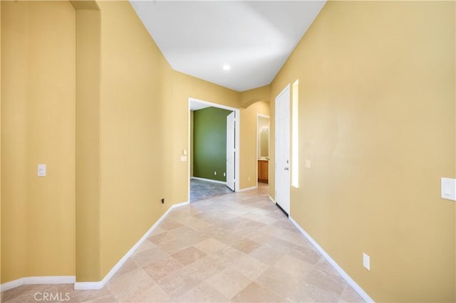 1706 Brittney Rd, Beaumont, CA 92223 - hallway with arched walkways and baseboards