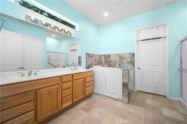 1706 Brittney Rd, Beaumont, CA 92223 - bathroom featuring double vanity and a shower stall