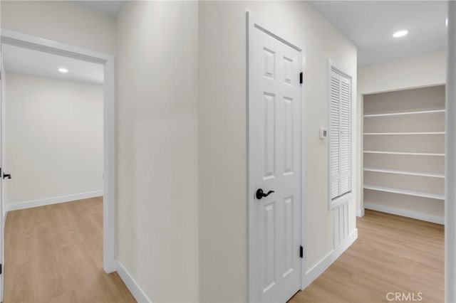 12815 Rexton St, Norwalk, CA 90650 - hall with light wood-style flooring and recessed lighting
