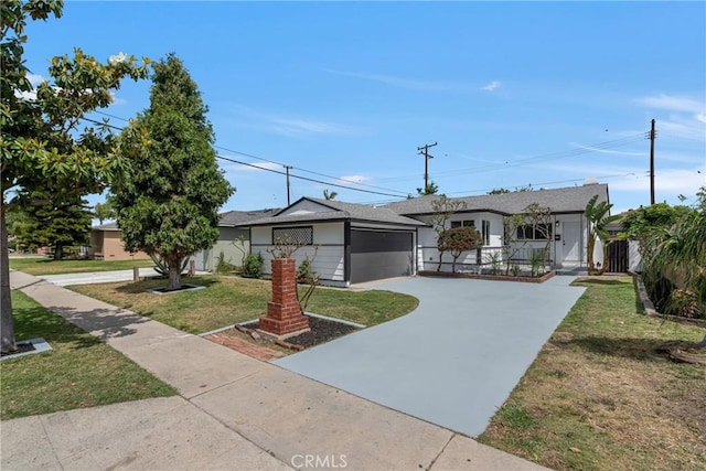 12815 Rexton St, Norwalk, CA 90650 - single story home with an attached garage, driveway, and a front lawn