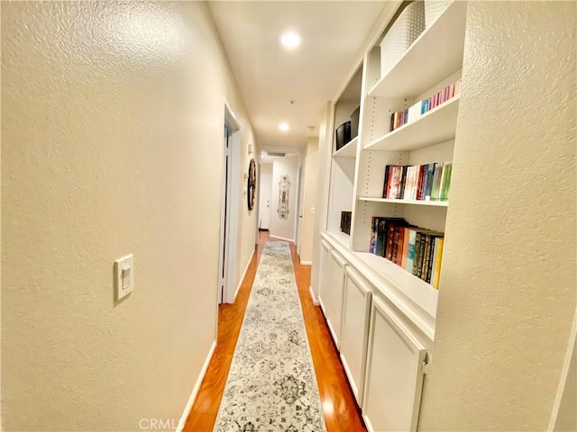 980 Lexington St, Hemet, CA 92545 - hall featuring light wood finished floors and a textured wall