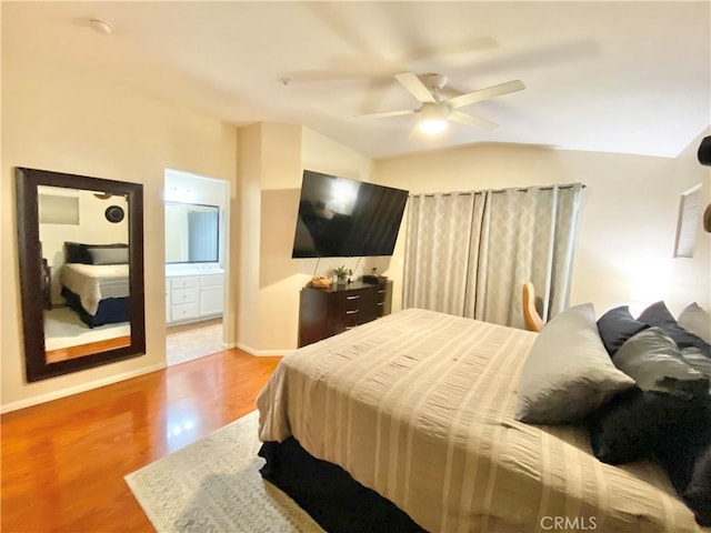 980 Lexington St, Hemet, CA 92545 - bedroom featuring wood finished floors, ensuite bathroom, vaulted ceiling, and ceiling fan