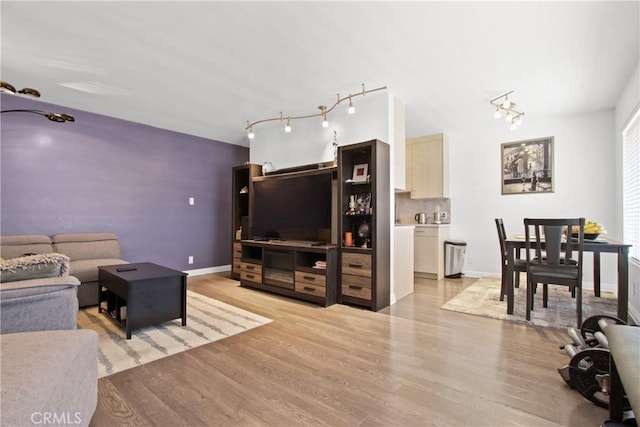527 Cedar Ave Unit 2K, Long Beach, CA 90802 - living area featuring light wood-style flooring and track lighting