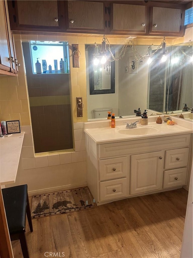 6070 Manzanita Ct, Angelus Oaks, CA 92305 - bathroom with wood finished floors and vanity