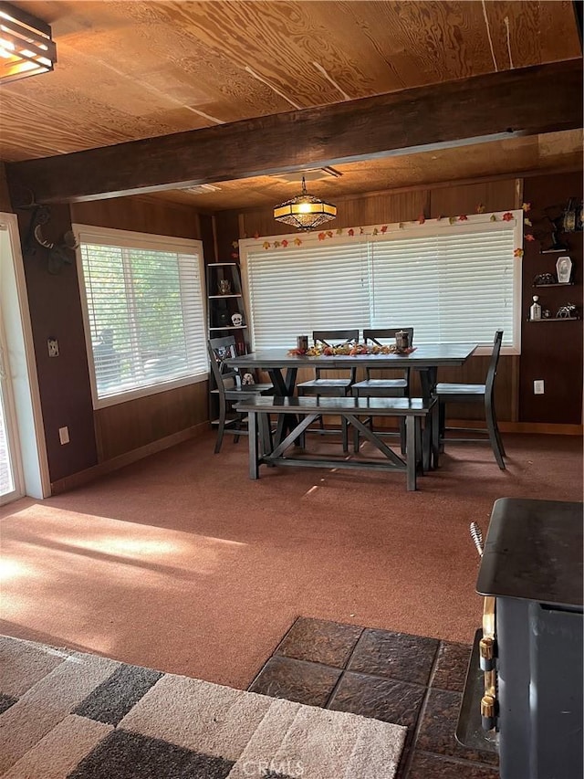 6070 Manzanita Ct, Angelus Oaks, CA 92305 - dining space featuring wood walls, carpet floors, and a wooden ceiling with exposed beams