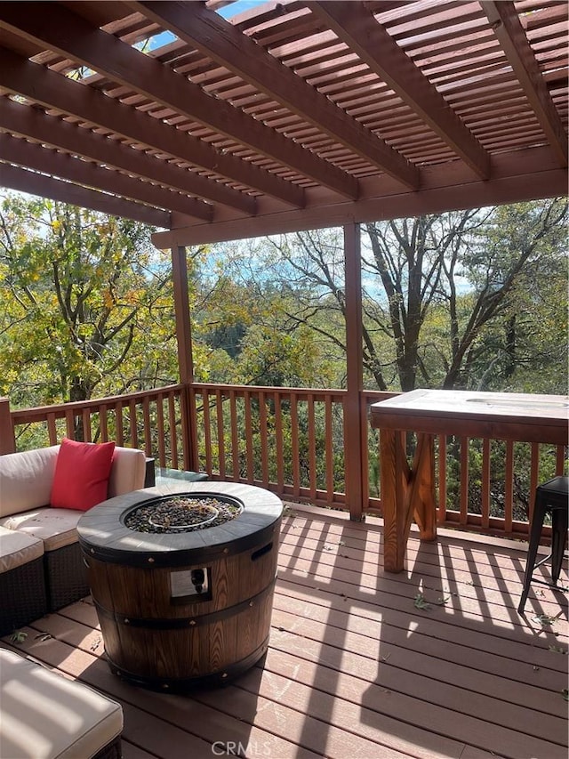6070 Manzanita Ct, Angelus Oaks, CA 92305 - wooden deck featuring a pergola and an outdoor living space with a fire pit