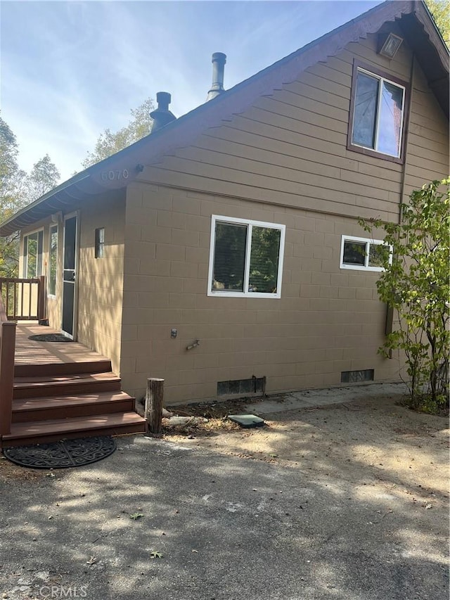 6070 Manzanita Ct, Angelus Oaks, CA 92305 - view of side of property with a wooden deck