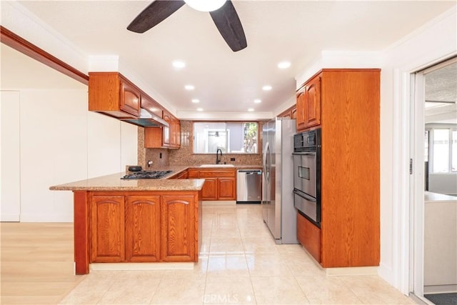 12711 Leroy Ave, Garden Grove, CA 92841 - kitchen with appliances with stainless steel finishes, a peninsula, a warming drawer, plenty of natural light, and recessed lighting
