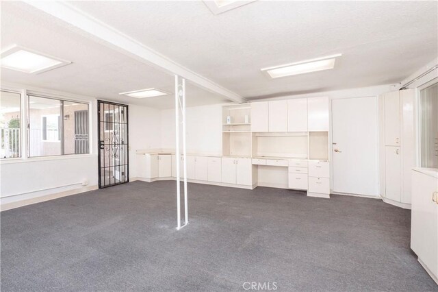 12711 Leroy Ave, Garden Grove, CA 92841 - below grade area featuring dark carpet and built in study area