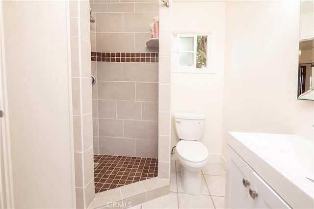 12711 Leroy Ave, Garden Grove, CA 92841 - bathroom featuring vanity, a tile shower, and tile patterned floors