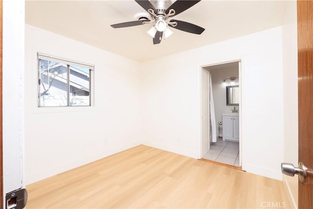 12711 Leroy Ave, Garden Grove, CA 92841 - unfurnished room with light wood-style flooring and a ceiling fan