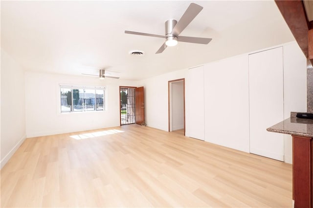 12711 Leroy Ave, Garden Grove, CA 92841 - unfurnished living room featuring light wood finished floors and ceiling fan