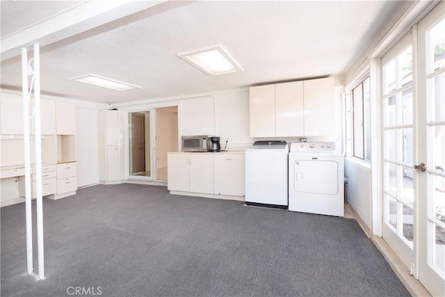 12711 Leroy Ave, Garden Grove, CA 92841 - laundry room with cabinet space, washing machine and dryer, and dark carpet