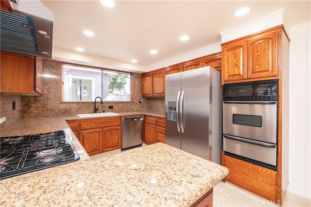 12711 Leroy Ave, Garden Grove, CA 92841 - kitchen featuring appliances with stainless steel finishes, a warming drawer, tasteful backsplash, recessed lighting, and exhaust hood