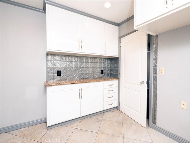12711 Leroy Ave, Garden Grove, CA 92841 - kitchen with white cabinets, stone counters, decorative backsplash, light tile patterned flooring, and recessed lighting