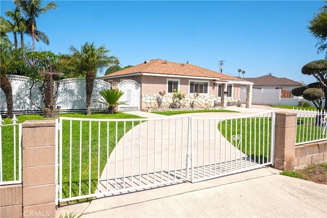 12711 Leroy Ave, Garden Grove, CA 92841 - view of front of property featuring a gate, a fenced front yard, and stucco siding