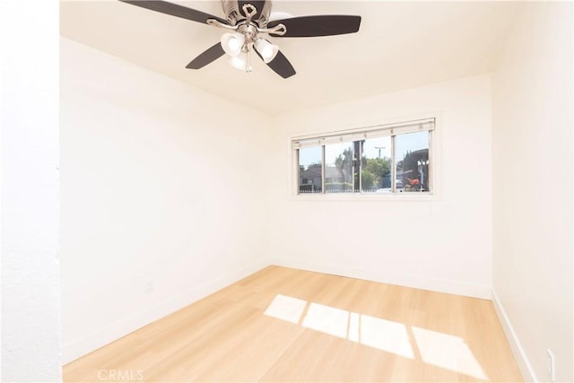12711 Leroy Ave, Garden Grove, CA 92841 - empty room with light wood finished floors and a ceiling fan