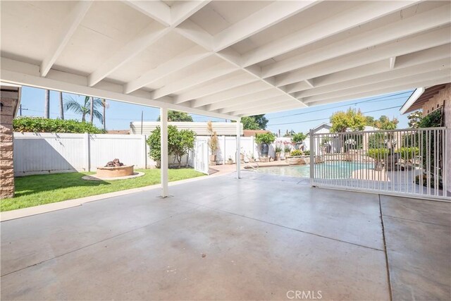 12711 Leroy Ave, Garden Grove, CA 92841 - fenced backyard featuring a fire pit and a patio