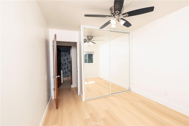 12711 Leroy Ave, Garden Grove, CA 92841 - unfurnished bedroom with light wood-style floors, a closet, and a ceiling fan