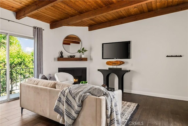 4230 Whitsett Ave Unit 6, Studio City, CA 91604 - living room with a wooden ceiling with exposed beams, hardwood / wood-style floors, and a lit fireplace