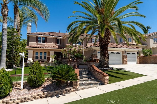 2417 Lenai Cir, Corona, CA 92879 - mediterranean / spanish home featuring stucco siding, a tile roof, concrete driveway, a chimney, and a garage