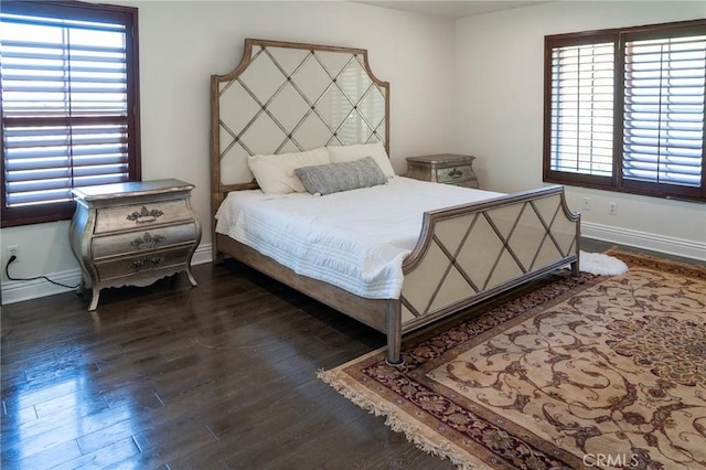 2417 Lenai Cir, Corona, CA 92879 - bedroom with multiple windows and dark wood-style flooring