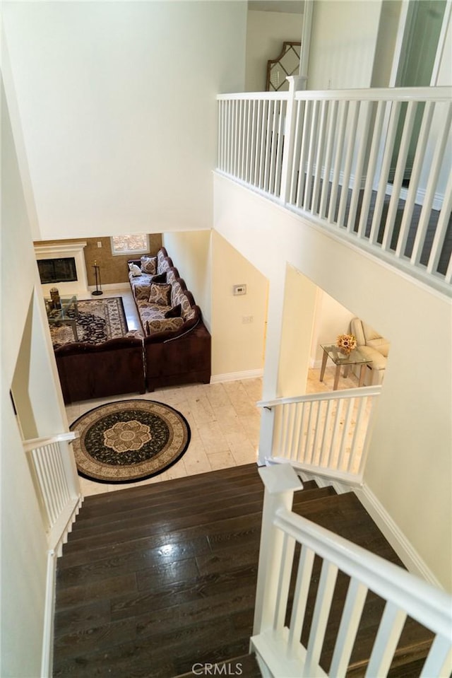 2417 Lenai Cir, Corona, CA 92879 - staircase featuring wood-type flooring and baseboards