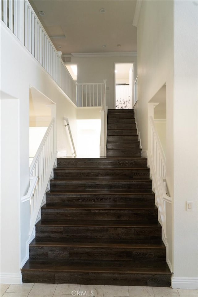 2417 Lenai Cir, Corona, CA 92879 - stairs with tile patterned flooring and crown molding