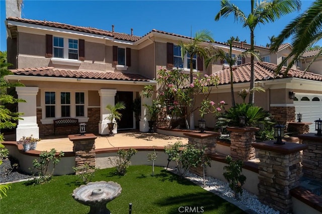 2417 Lenai Cir, Corona, CA 92879 - back of house with stucco siding, a tiled roof, and stone siding