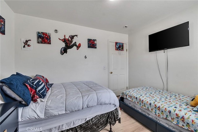 8630 Elba St, Pico Rivera, CA 90660 - bedroom featuring light wood finished floors