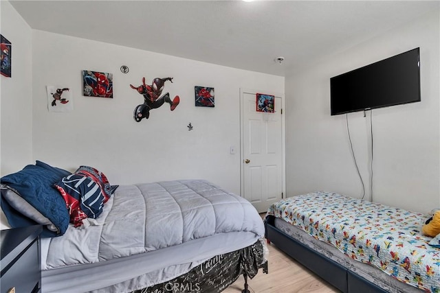 8630 Elba St, Pico Rivera, CA 90660 - bedroom featuring light wood finished floors