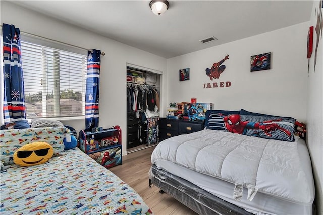 8630 Elba St, Pico Rivera, CA 90660 - bedroom with light wood-style flooring and a closet