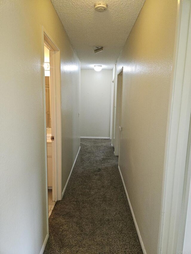 4028 Johnson Dr, Oceanside, CA 92056 - hall with carpet floors and a textured ceiling