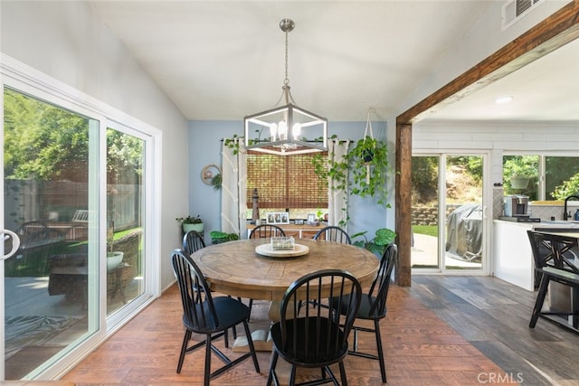705 Old Bridge Rd, Fallbrook, CA 92028 - dining area with a chandelier, healthy amount of natural light, and dark wood-type flooring