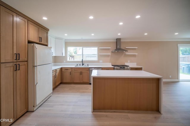 1100 Dahlia St, Oxnard, CA 93036 - kitchen featuring appliances with stainless steel finishes, wall chimney exhaust hood, open shelves, a center island, and light wood-style flooring