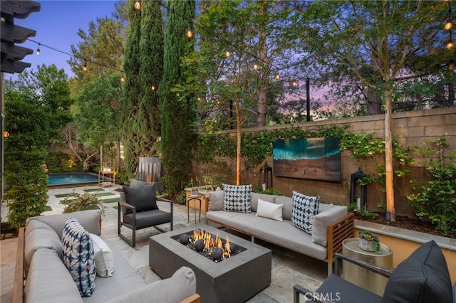 24 Tesoro, Irvine, CA 92618 - fenced backyard with an outdoor living space with a fire pit, a swimming pool, and a patio area
