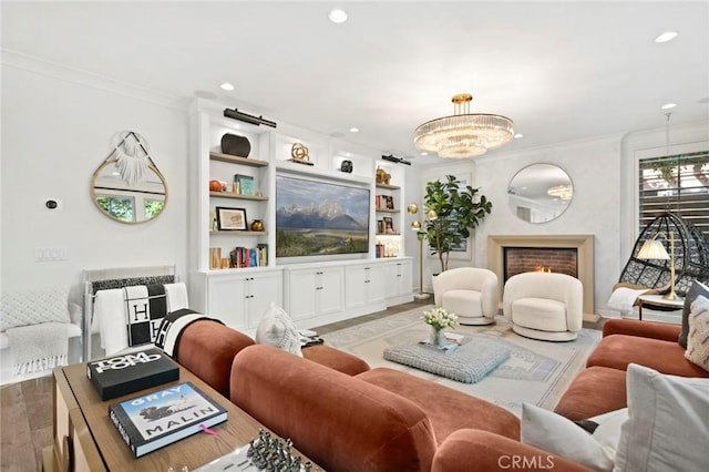24 Tesoro, Irvine, CA 92618 - living area with ornamental molding, recessed lighting, a chandelier, and built in shelves