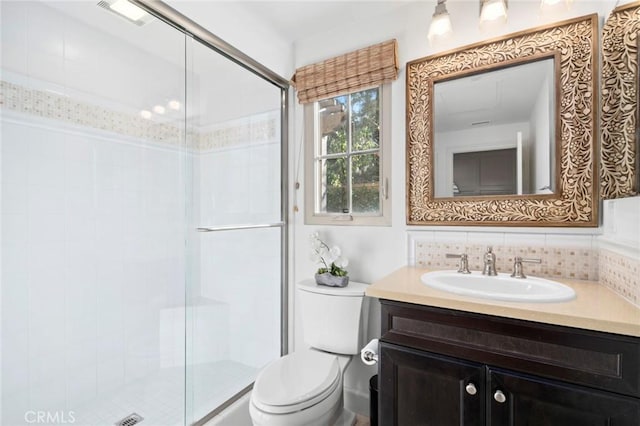 24 Tesoro, Irvine, CA 92618 - bathroom with vanity, a shower stall, and tasteful backsplash