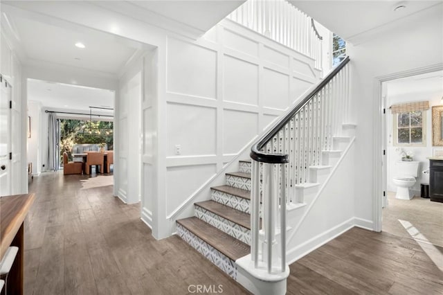 24 Tesoro, Irvine, CA 92618 - staircase with wood finished floors, crown molding, and recessed lighting