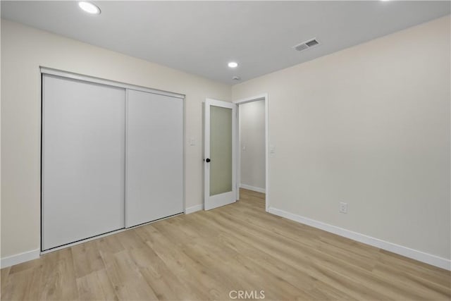 40635 159th St E, Lancaster, CA 93535 - unfurnished bedroom featuring wood finished floors, recessed lighting, and a closet