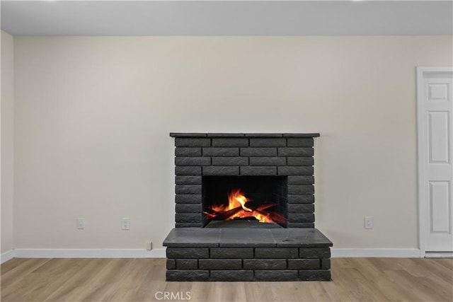40635 159th St E, Lancaster, CA 93535 - detailed view of a brick fireplace and wood finished floors