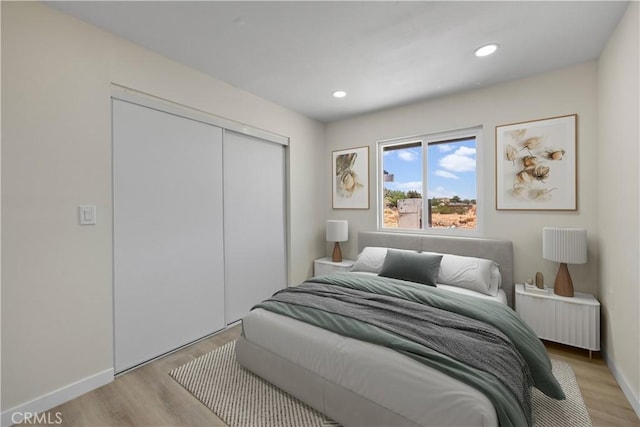40635 159th St E, Lancaster, CA 93535 - bedroom featuring light wood-type flooring, a closet, and recessed lighting
