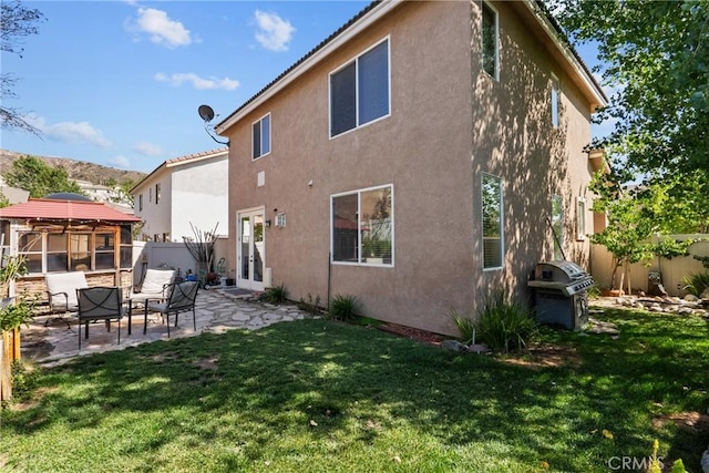 29513 Blake Way, Canyon Country, CA 91387 - back of house with a gazebo, stucco siding, and a patio