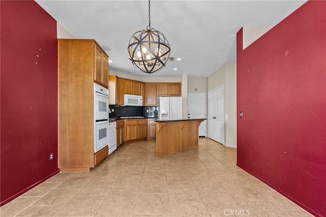 29513 Blake Way, Canyon Country, CA 91387 - kitchen featuring white appliances, a chandelier, tasteful backsplash, a center island, and a breakfast bar area