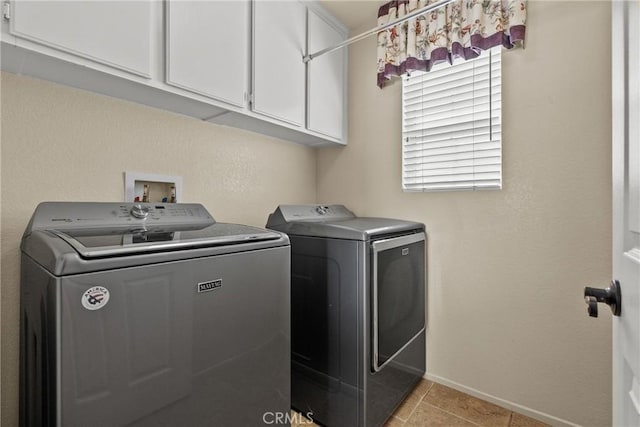 29513 Blake Way, Canyon Country, CA 91387 - laundry area with washer and clothes dryer, cabinet space, and light tile patterned floors