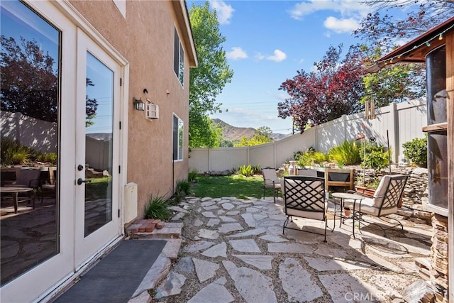 29513 Blake Way, Canyon Country, CA 91387 - fenced backyard with a patio, french doors, and a mountain view